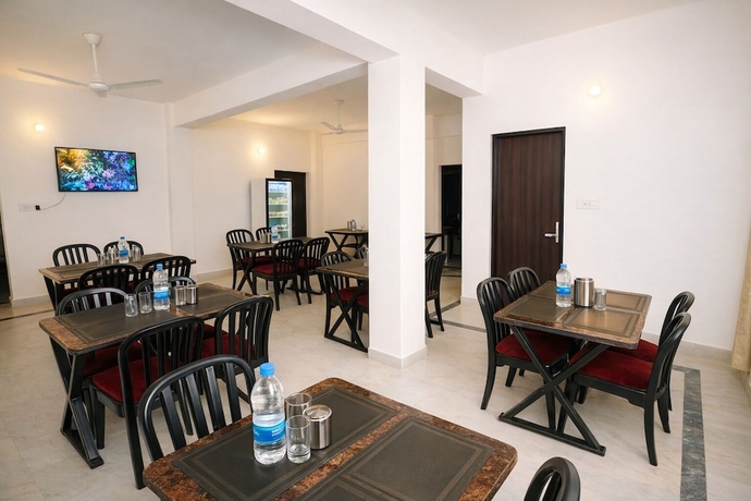Imagen del bar/restaurante del Hotel Gangabagh by Divine Trails - Near Har Ki Pauri, Haridwar. Foto 2