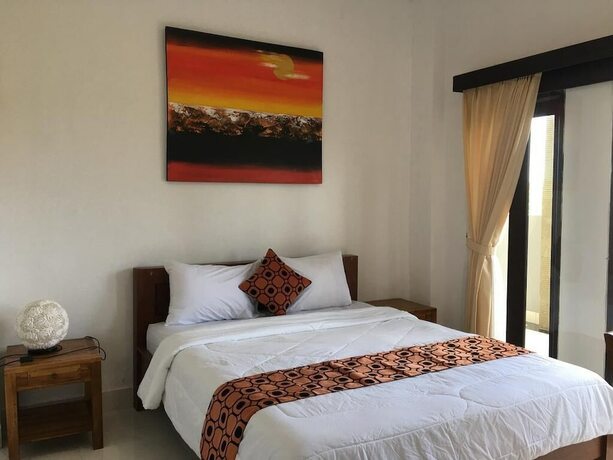 Imagen de la habitación del Hotel Gangga Guesthouse. Foto 16