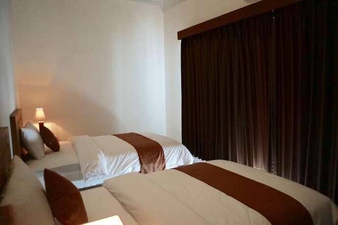 Imagen de la habitación del Hotel Gangga Guesthouse. Foto 23