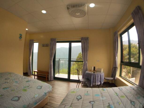 Imagen de la habitación del Hotel Ganghao. Foto 11