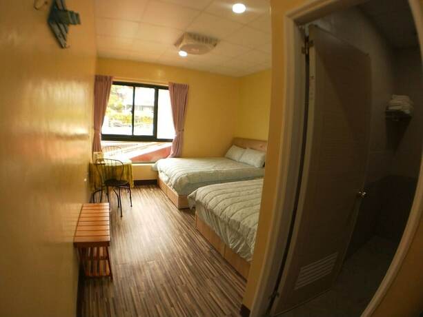 Imagen de la habitación del Hotel Ganghao. Foto 12