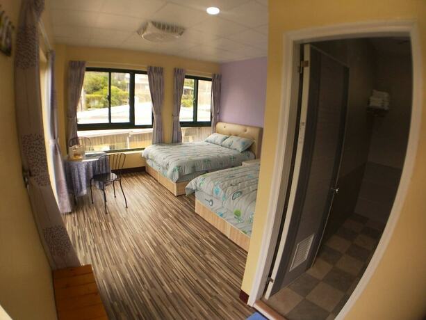 Imagen de la habitación del Hotel Ganghao. Foto 13