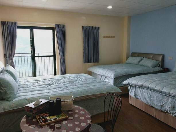 Imagen de la habitación del Hotel Ganghao. Foto 14
