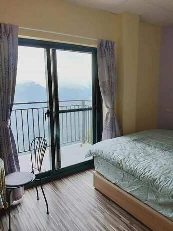 Imagen de la habitación del Hotel Ganghao. Foto 17