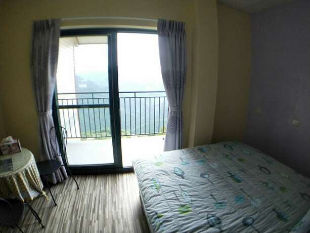 Imagen de la habitación del Hotel Ganghao. Foto 18