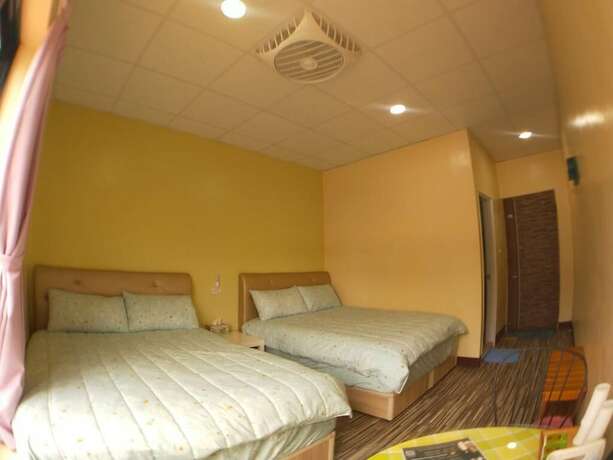 Imagen de la habitación del Hotel Ganghao. Foto 20