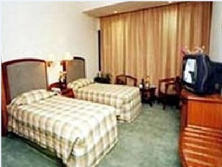 Imagen de la habitación del Hotel Gangjong. Foto 5