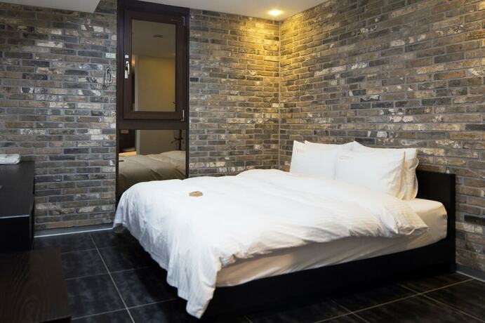 Imagen de la habitación del Hotel Gangnam Campus. Foto 12