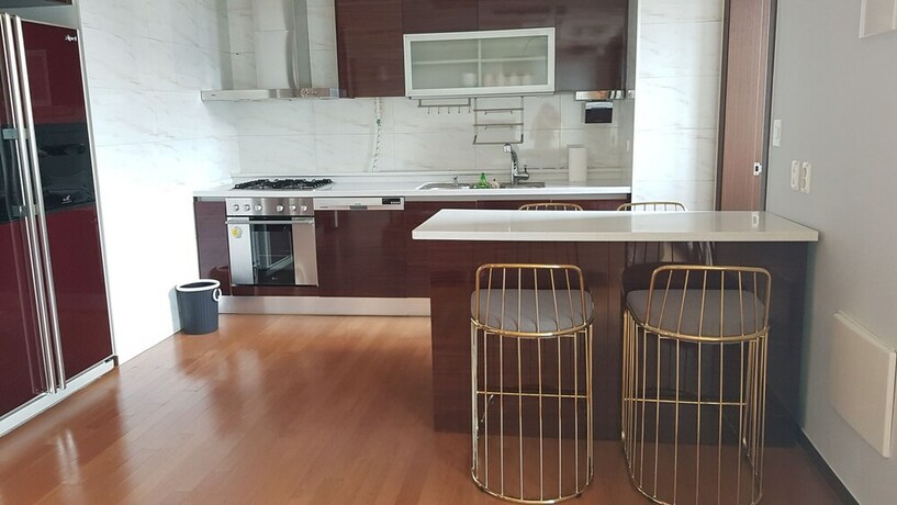 Imagen de la habitación del Hotel Gangnam Stn Luxury Apt. Foto 27