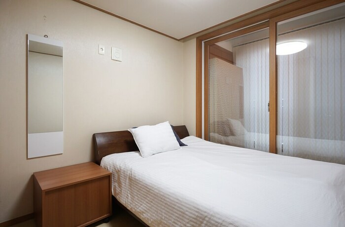 Imagen de la habitación del Hotel Gangnam Stn Luxury Apt. Foto 31