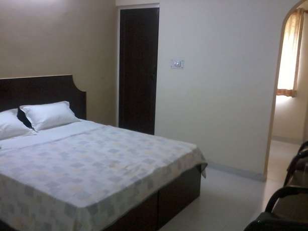 Imagen de la habitación del Hotel Gangotri, Haridwar. Foto 10