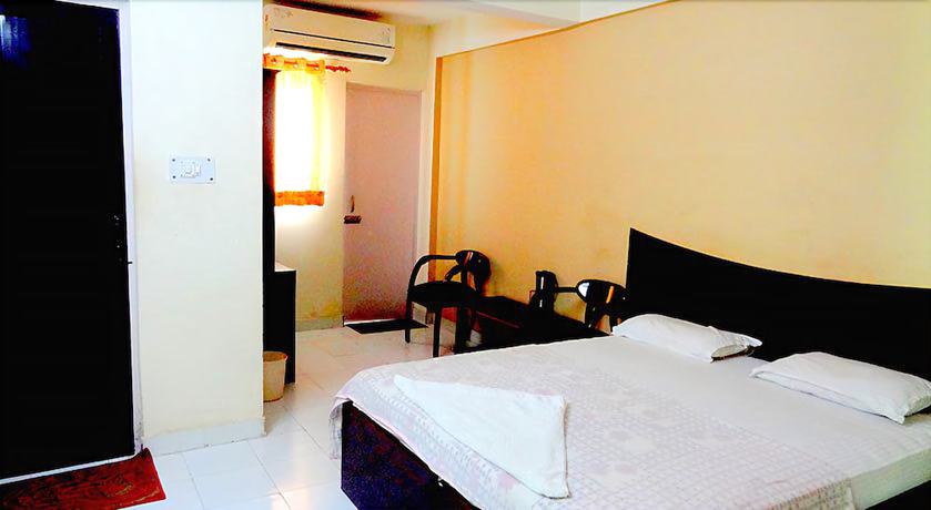 Imagen de la habitación del Hotel Gangotri, Haridwar. Foto 14