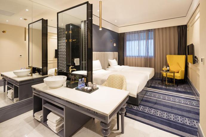 Imagen de la habitación del Hotel Gangrun East Asia. Foto 2