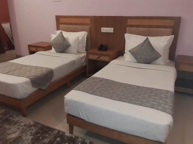 Imagen de la habitación del Hotel Ganpati Resort. Foto 8