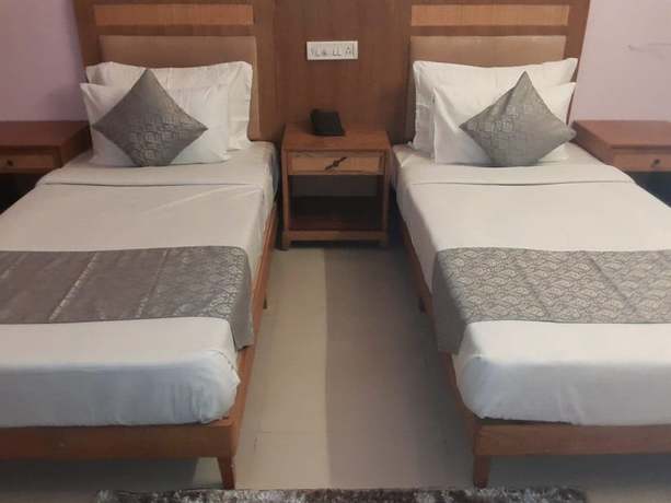 Imagen de la habitación del Hotel Ganpati Resort. Foto 14