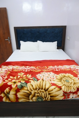 Imagen de la habitación del Hotel Ganpati Shri P. Guest House. Foto 8