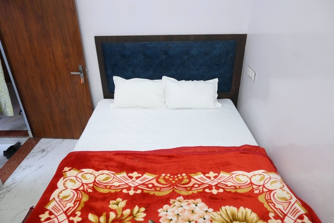 Imagen de la habitación del Hotel Ganpati Shri P. Guest House. Foto 9