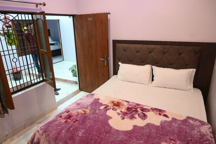 Imagen de la habitación del Hotel Ganpati Shri P. Guest House. Foto 11