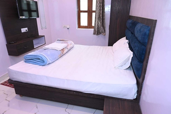 Imagen de la habitación del Hotel Ganpati Shri P. Guest House. Foto 16