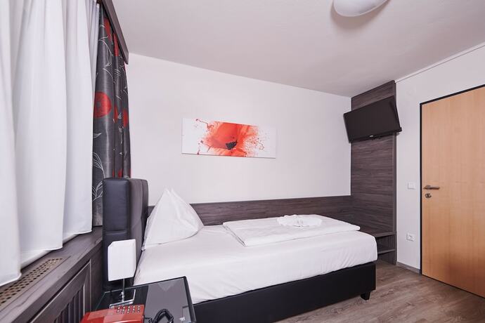 Imagen de la habitación del Hotel Ganslhof, Salzburgo. Foto 13
