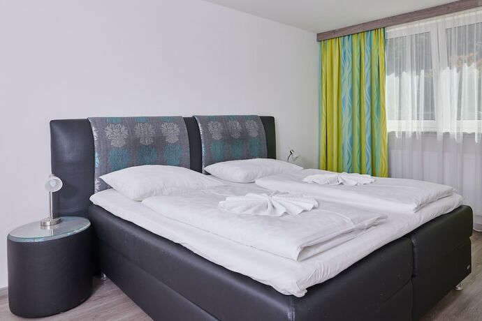 Imagen de la habitación del Hotel Ganslhof, Salzburgo. Foto 15
