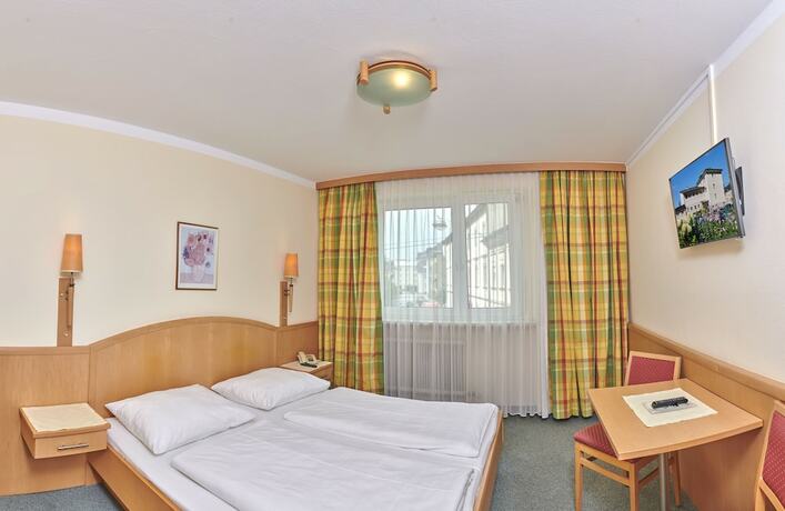 Imagen de la habitación del Hotel Ganslhof, Salzburgo. Foto 19