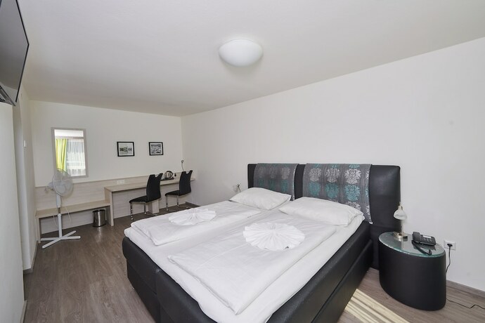 Imagen de la habitación del Hotel Ganslhof, Salzburgo. Foto 20