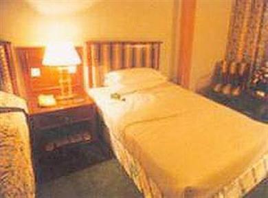 Imagen de la habitación del Hotel Gansu International. Foto 3