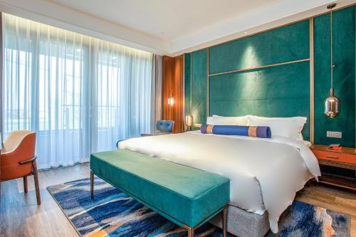 Imagen de la habitación del Hotel Gao Shi Di Hot Spring Yangzhou. Foto 17