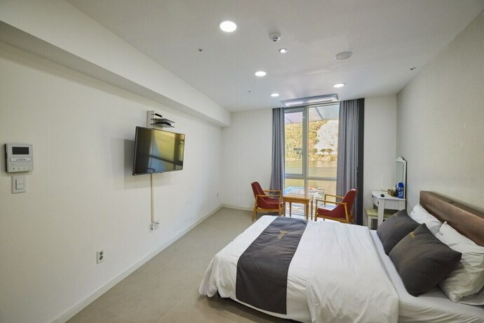 Imagen de la habitación del Hotel Gapyeong Puffinsbay Pension. Foto 11