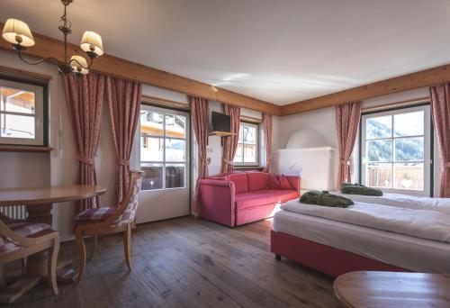 Imagen de la habitación del Hotel Garberhof Dolomit Family. Foto 8