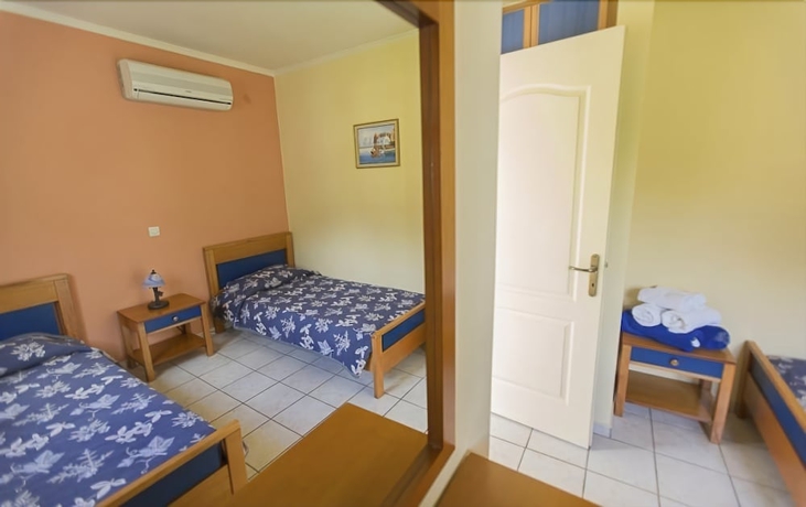 Imagen de la habitación del Hotel Garbis Villas. Foto 18