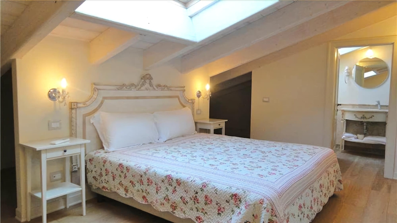 Imagen de la habitación del Hotel Garda San Vigilio Golf. Foto 10