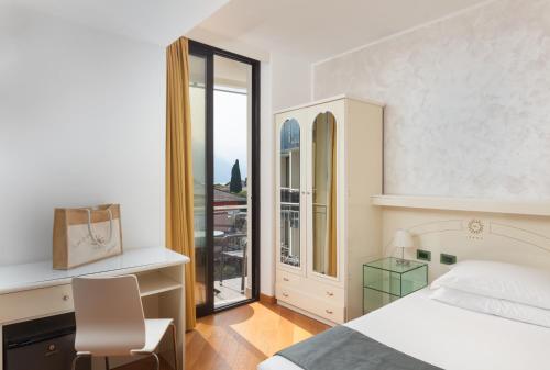 Imagen de la habitación del Hotel Garda - TonelliHotels. Foto 6