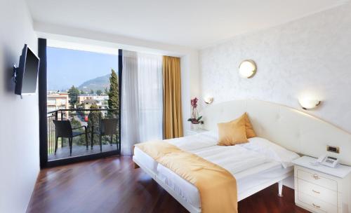 Imagen de la habitación del Hotel Garda - TonelliHotels. Foto 9