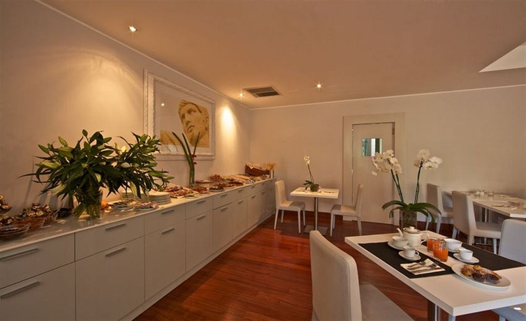 Imagen del bar/restaurante del Hotel Garden Area Roma Eur. Foto 3