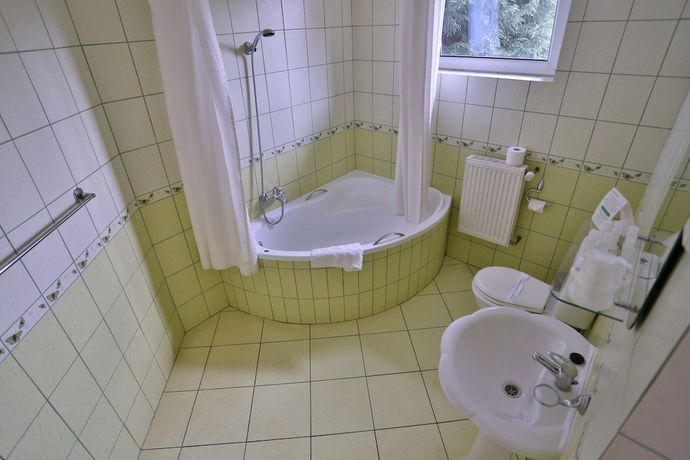 Imagen de la habitación del Hotel Garden, Boleslawiec. Foto 14