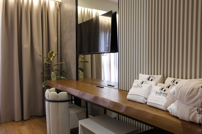 Imagen de la habitación del Hotel Garden Boutique. Foto 7