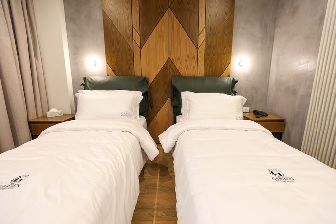 Imagen de la habitación del Hotel Garden Boutique. Foto 10