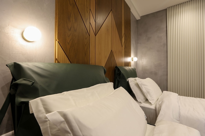 Imagen de la habitación del Hotel Garden Boutique. Foto 11
