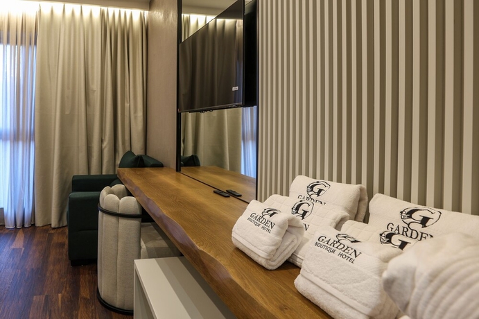 Imagen de la habitación del Hotel Garden Boutique. Foto 12