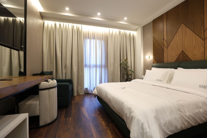 Imagen de la habitación del Hotel Garden Boutique. Foto 13