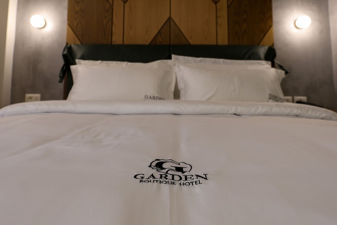 Imagen de la habitación del Hotel Garden Boutique. Foto 14