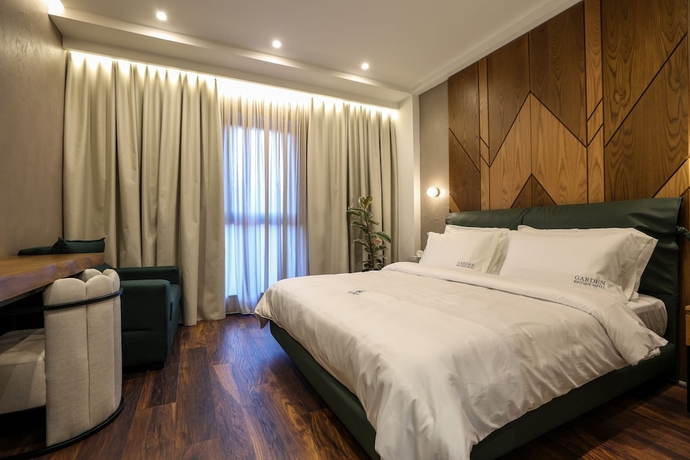 Imagen de la habitación del Hotel Garden Boutique. Foto 17