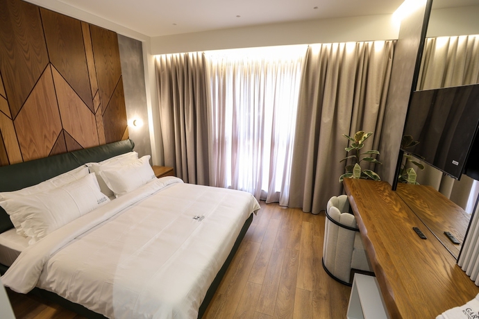 Imagen de la habitación del Hotel Garden Boutique. Foto 18