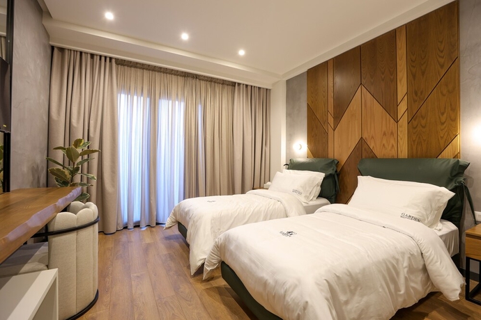Imagen de la habitación del Hotel Garden Boutique. Foto 19