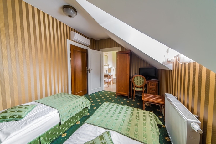 Imagen de la habitación del Hotel Garden Boutique Residence. Foto 3