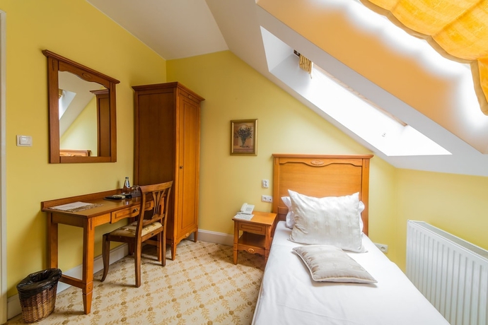 Imagen de la habitación del Hotel Garden Boutique Residence. Foto 4