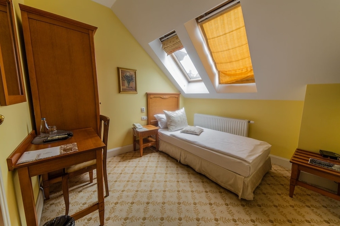 Imagen de la habitación del Hotel Garden Boutique Residence. Foto 5
