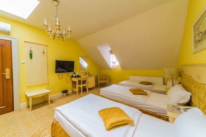 Imagen de la habitación del Hotel Garden Boutique Residence. Foto 6
